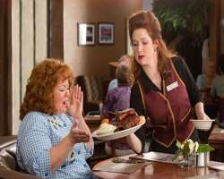 The actress appeared for an uncredited role as Flo in the comedy film 